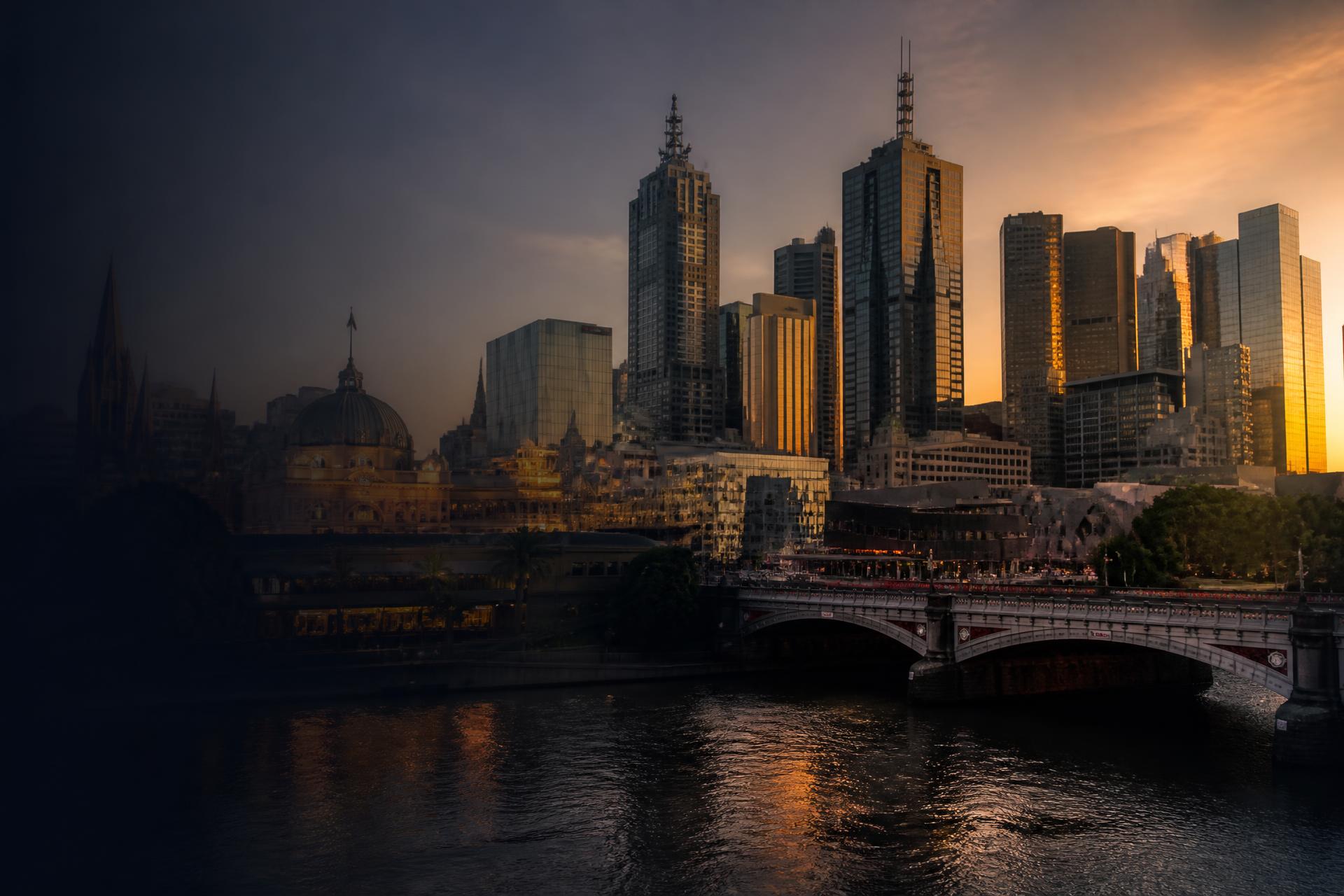 Melbourne city skyline over the Yarra River at golden hour